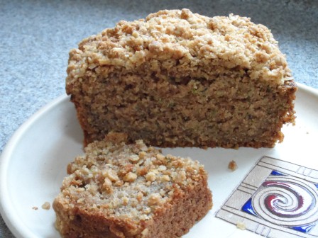 Zucchini bread with crumb topping on Vinegar Hill pottery.