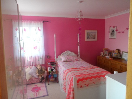 Our littlest one's very pink room!