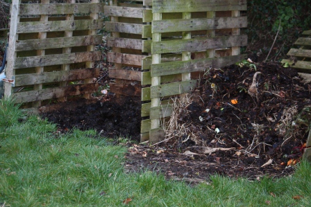 Two composting enclosures.