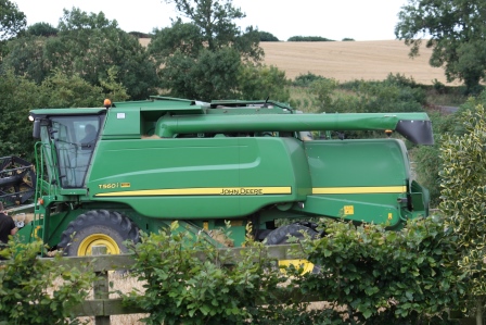 Time for the farmer to harvest the barley.