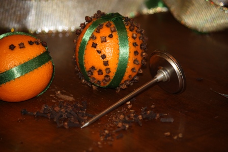 Cooking thermometer used to make holes in an orange.