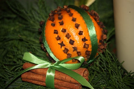 clove & orange pomander with cinnamon sticks