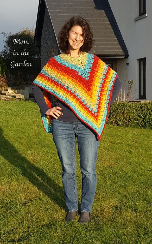 completed rainbow poncho