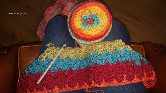 Caron Cakes yarn in Rainbow sprinkles color with start of poncho