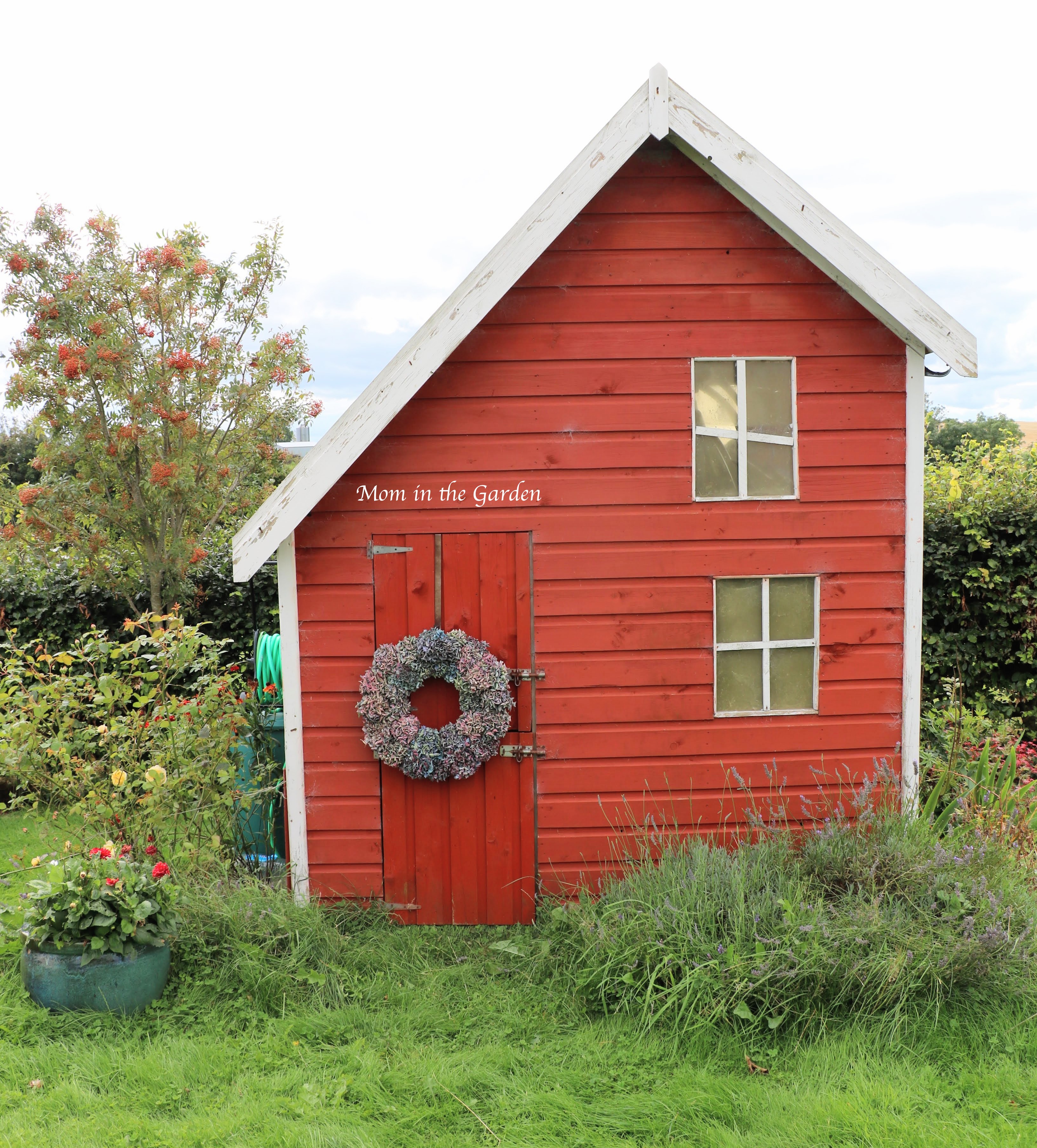 blue hydrangea wreath on playhouse