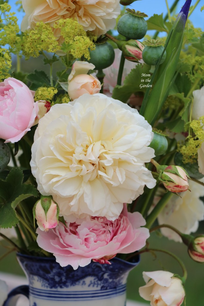 flower arrangement cream roses and peony