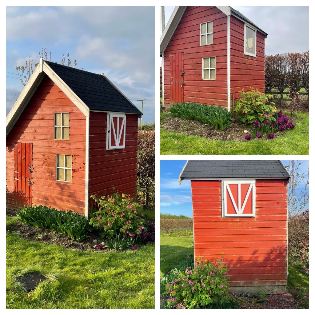 View of the new window cover designed like traditional American Red Barn doors.
