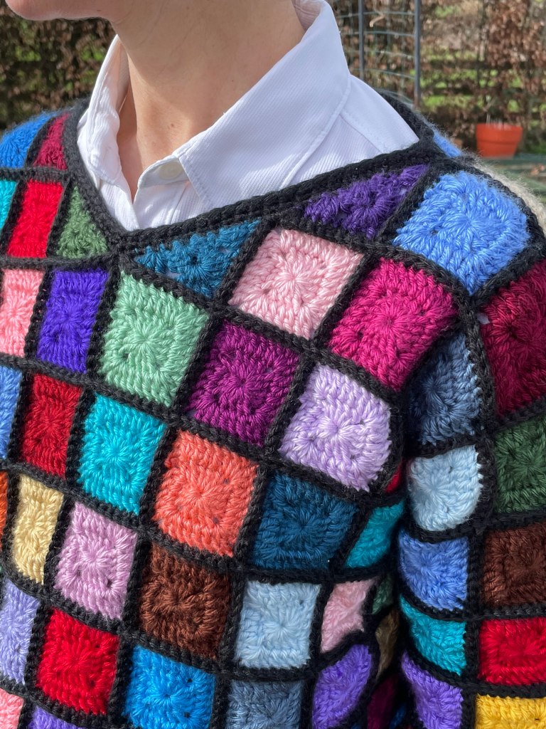 neckline of finished crochet granny square crochet sweater