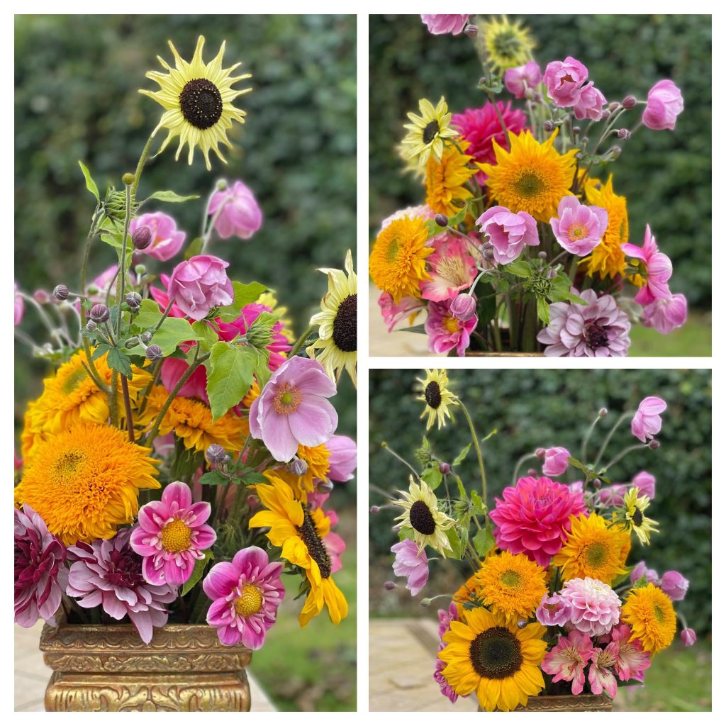 flower arrangement of sunflowers and dahlias and Japanese anemone